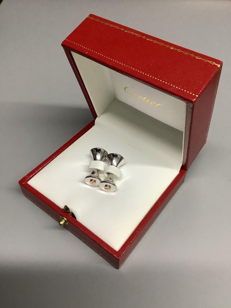 A modern pair of Cartier 925 and yellow metal cufflinks, modelled as a pair of dumbbells, 23 mm.